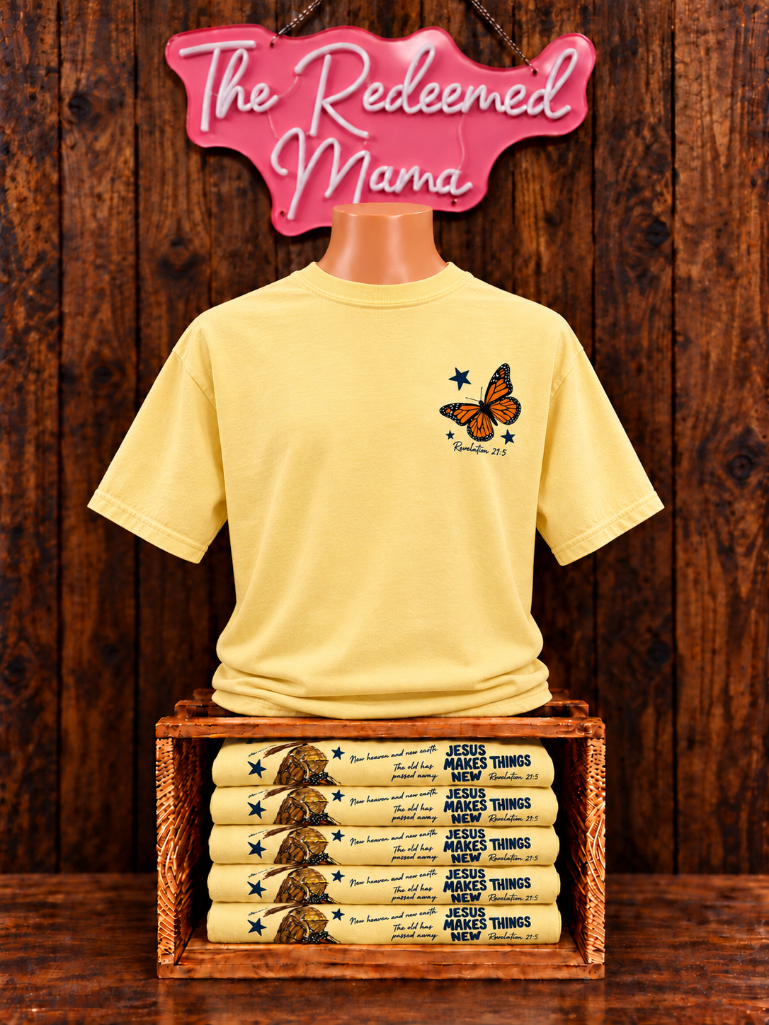 Folded yellow butterfly graphic tees display
